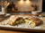 Il calzone al pistacchio tagliato: dentro la crema di pistacchio e il formaggio vegetale che fila